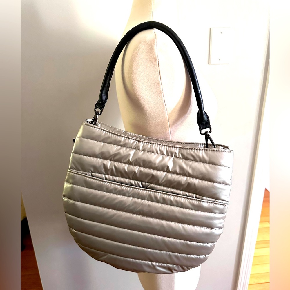 Think Royln “U” Messenger Silver bag with black crossbody strap